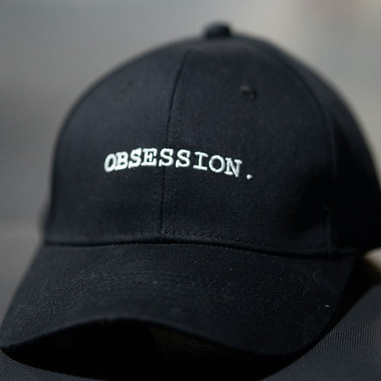 "OBSESSION." Hat